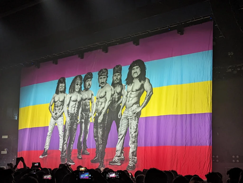 Electric Callboy Live Portsmouth Guildhall. Pump it banner showing the band in workout clothes